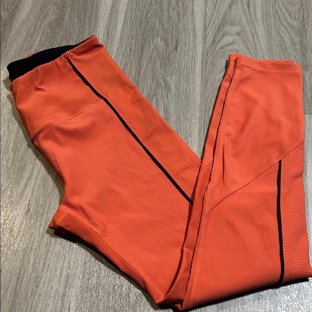 Stylish Orange Leggings with Black Trim - Picture 7 of 10